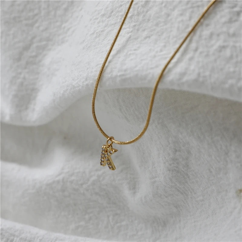 Dainty pavé initial necklace